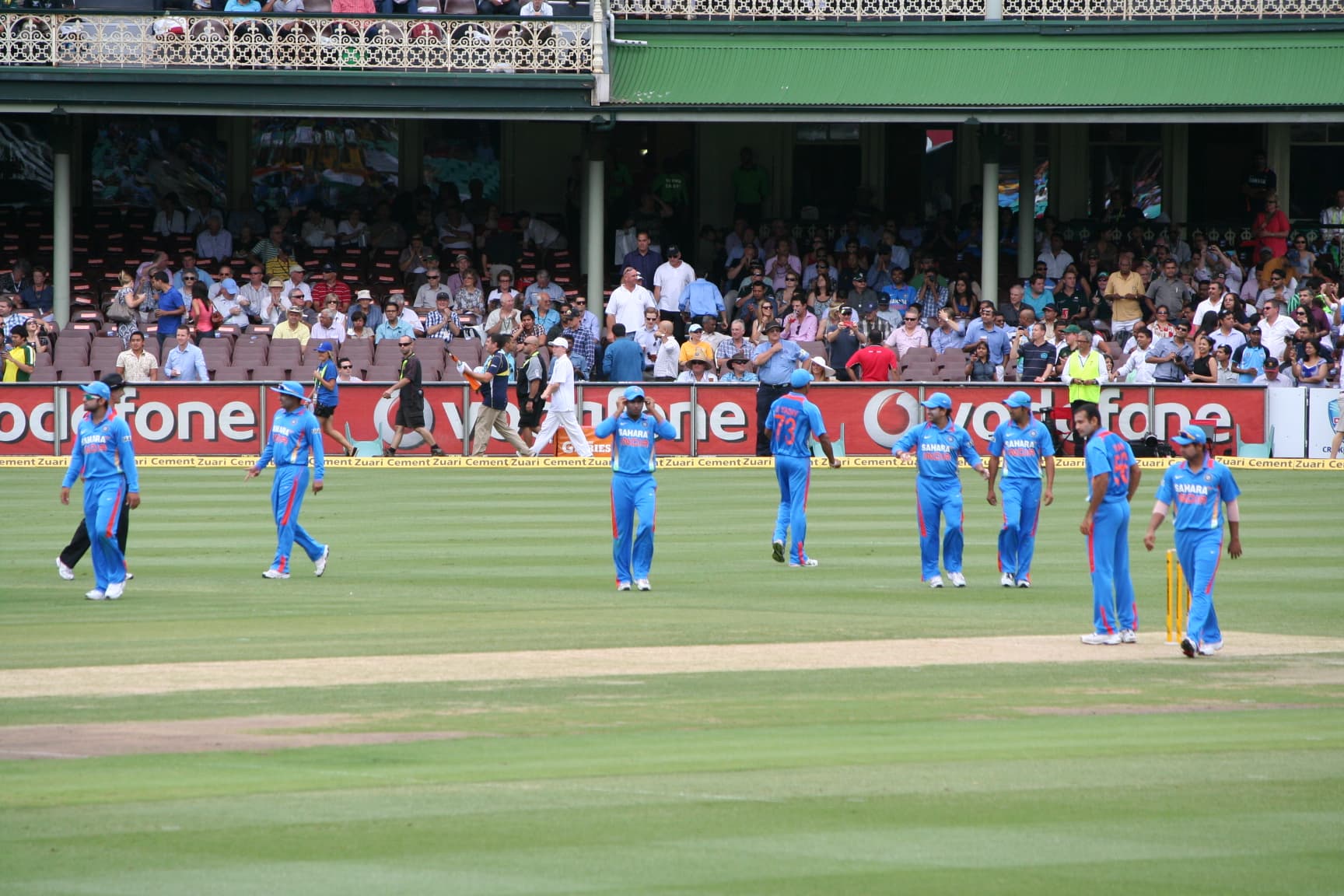 Indian and English cricket players shaking hands on the field at Edgbaston